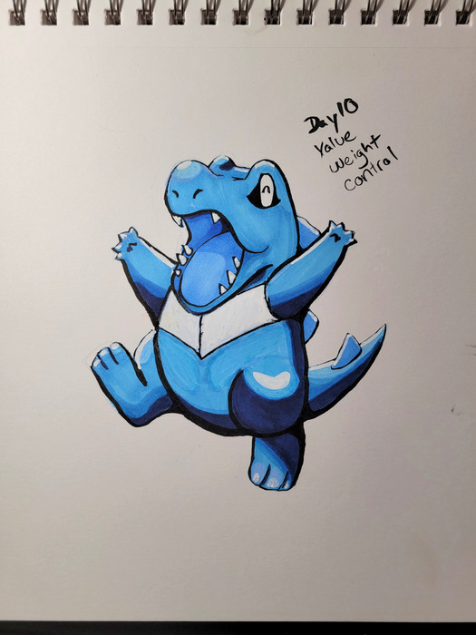 Blue Totodile marker study in a spiral sketchbook with a handwritten note